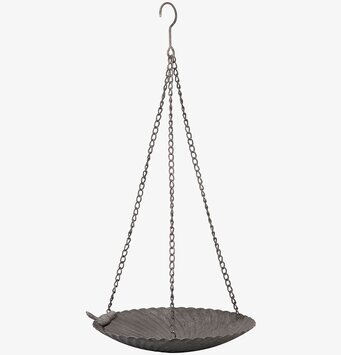 Foto av dekorativt fågelbad i metall för trädgården