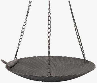 Foto av rustikt fågelbad i metall med sparvdekor