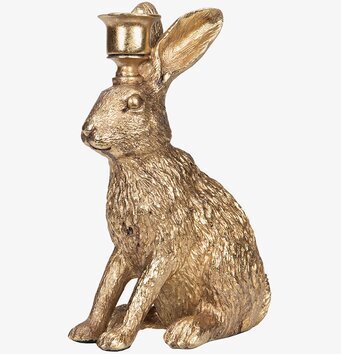 Bild av elegant ljusstake med sittande hare-design