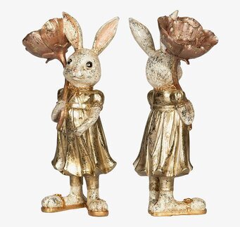 Bild av charmig kaninfigur med blomma i antik stil