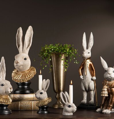 Bild av stiliserade kaninprydnader och ljushållare