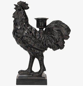 Bild av en detaljrik ljusstake med tuppdesign