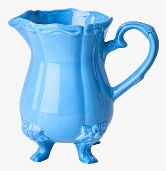 Foto av blå keramikvas med unik och elegant design