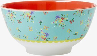 Bild av färgglad skål med blommigt mönster och röd insida