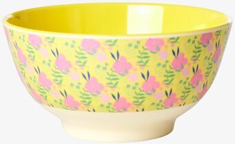 Foto av färgglad skål med blommönster och gul insida