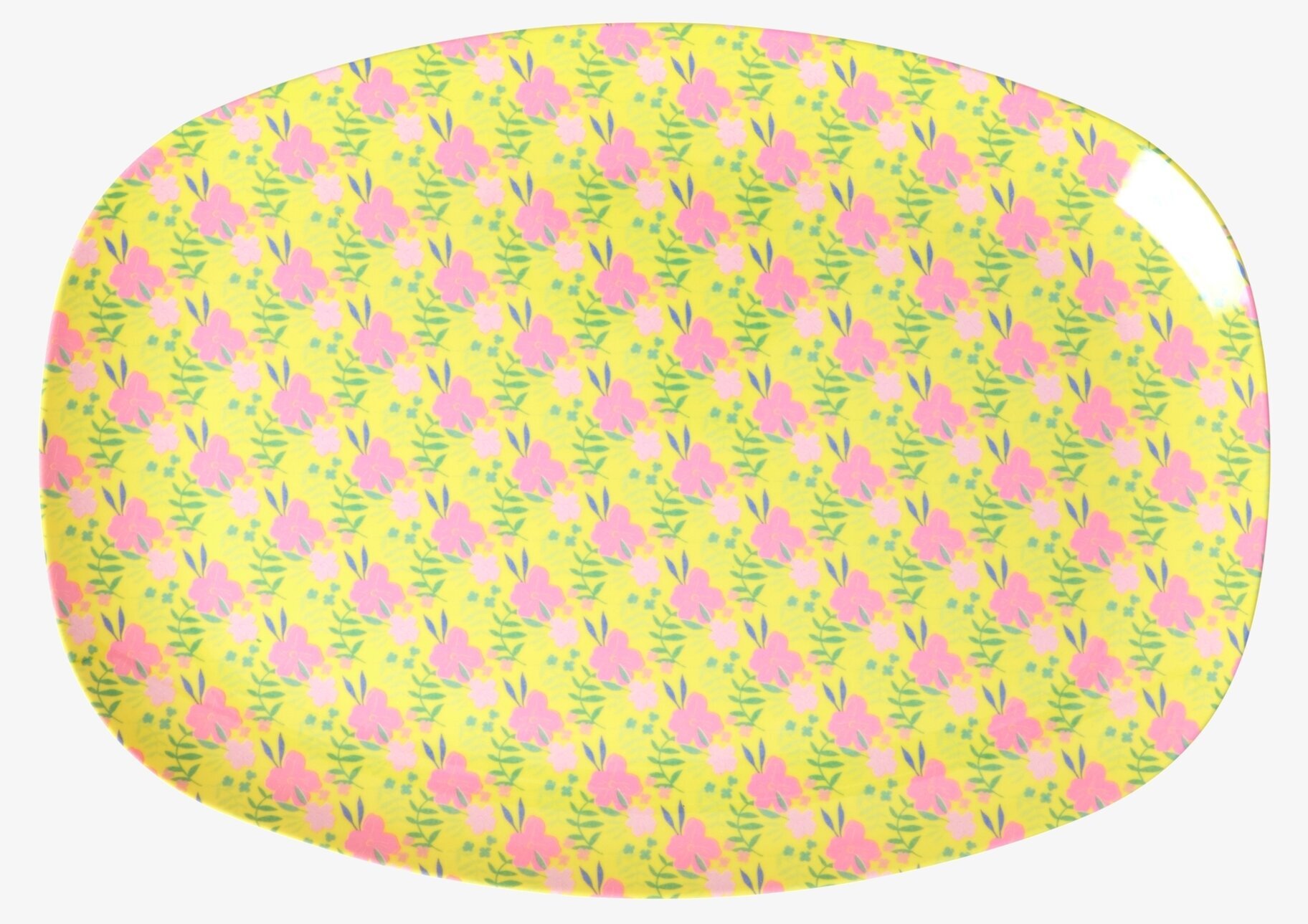 Bild av färgglad tallrik med blommönster och blad