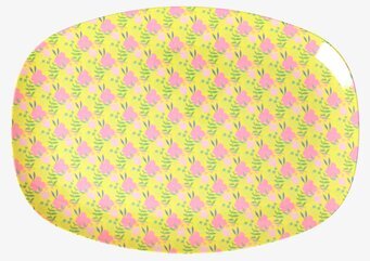 Bild av färgglad tallrik med blommönster och blad