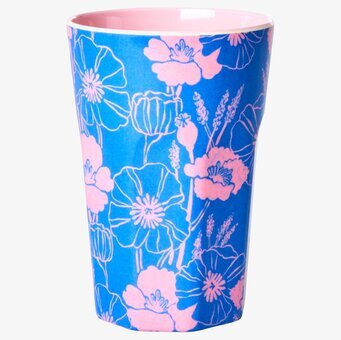 Bild av färgglad mugg med blommotiv och rosa insida