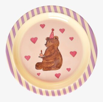 Foto av barntallrik med lekfullt och festligt motiv