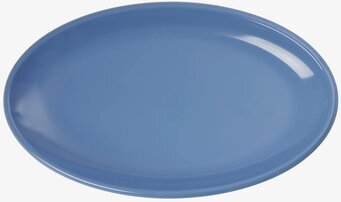 Foto av ett elegant ovalt serveringsfat i blå nyans