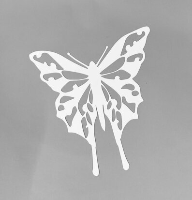 Bild av elegant vit fjärilsdekoration i plåt