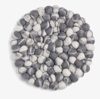 Bild av elegant och funktionellt grytunderlägg i ull