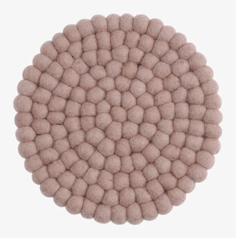 Bild av runt grytunderlägg i lavendelfärgad ull