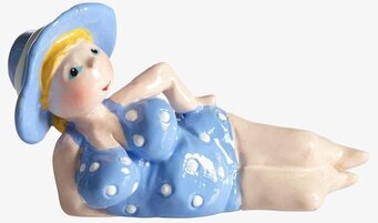 Bild av charmig figur i retrostil och sommarkänsla