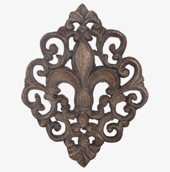 Bild av elegant väggdekoration i trä med fleur-de-lis
