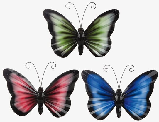 Bild av tre fjärilar i hamrad plåt för väggdekoration