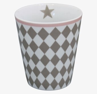 Foto av mugg med geometriskt mönster och stjärndetalj