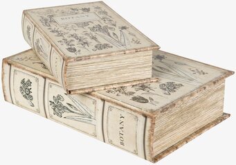 Foto av dekorativ boklåda med botaniska motiv