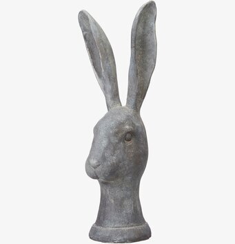 Bild av en gråmelerad kaninskulptur med detaljer