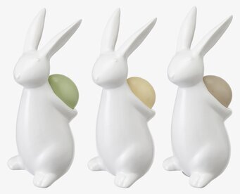 Bild av stilrena keramiska harar med färgglada ägg