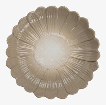 Bild av djupt fat med unik design och beige nyans