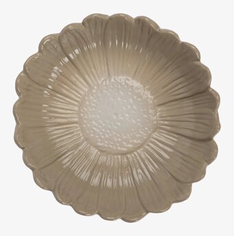 Bild av djupt beige fat med naturinspirerad design