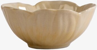 Bild av elegant beige skål med blomliknande form