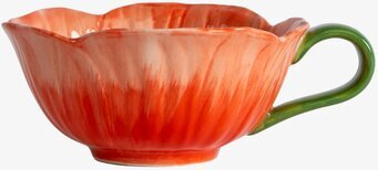 Foto av elegant kopp med unik design och färgskala