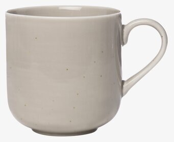 Foto av stilren mugg med jordig nyans och textur