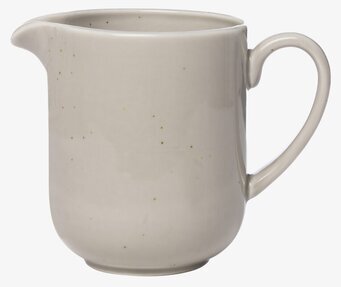 Bild av mjölkkanna med stilren och funktionell design