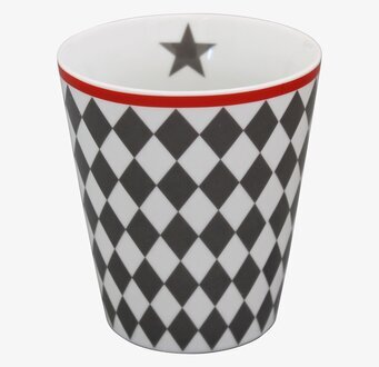 Foto av geometriskt mönstrad keramikmugg med stjärndetalj