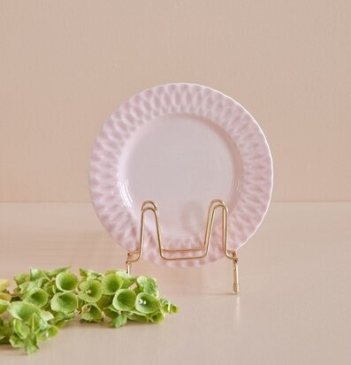 Bild av rosa keramik med elegant design och detaljer