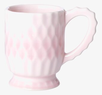 Bild av rosa keramikmugg med unikt designat utseende