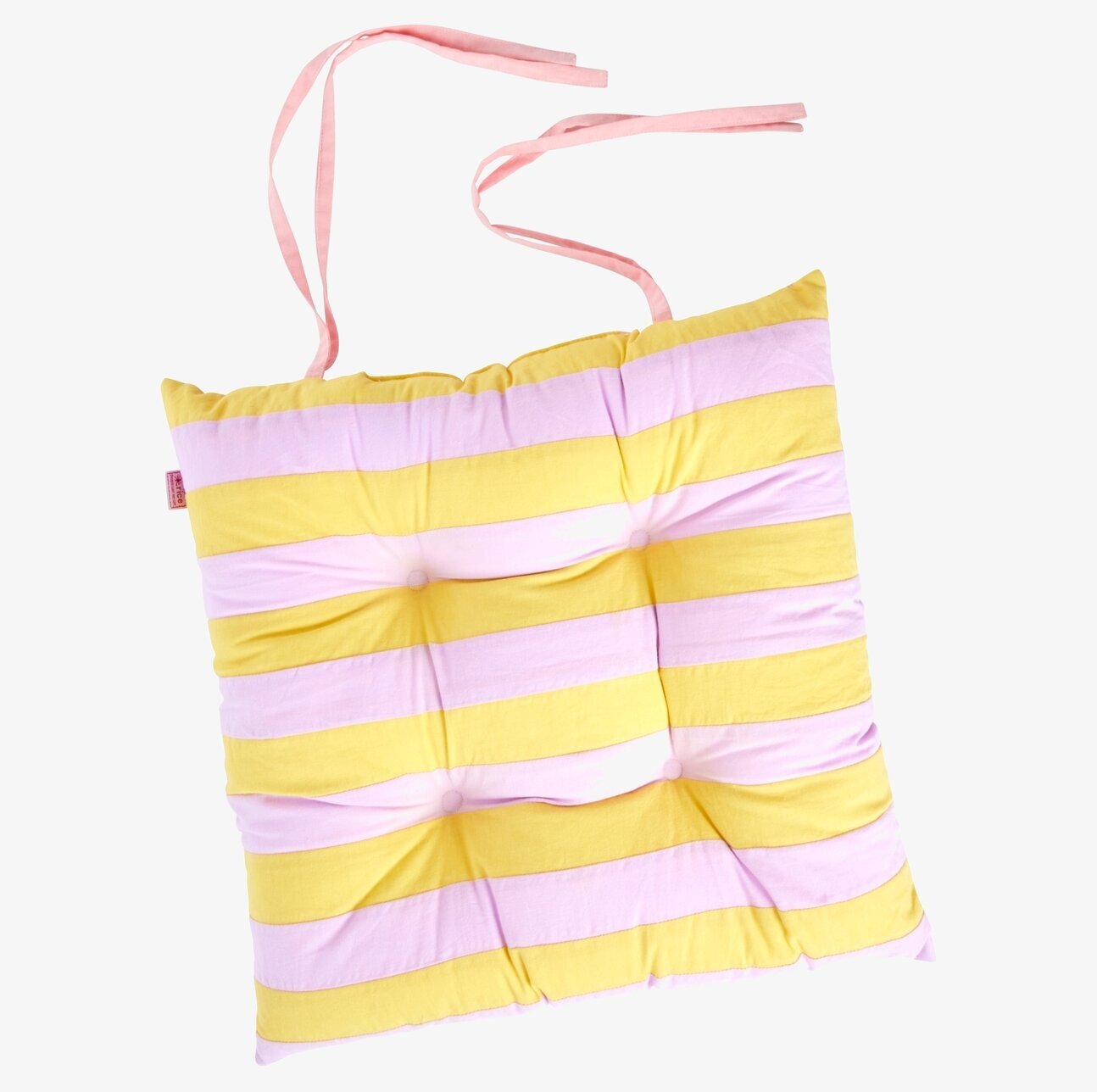 Bild av färgglad randig stolsdyna i gula och lila toner