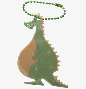 Bild av lekfull drakreflex med gröna nyanser och kedja
