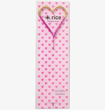 Bild av hjärtformat tomtebloss i rosa och guld