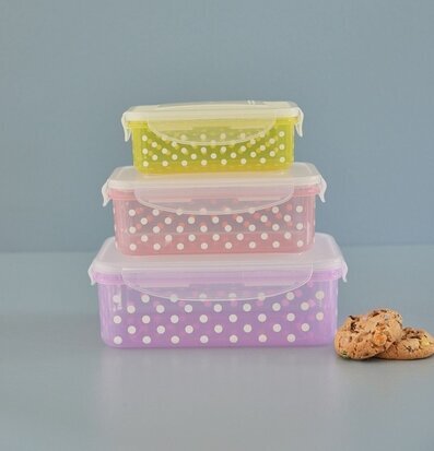 Bild av stilrena förvaringsburkar i olika färger