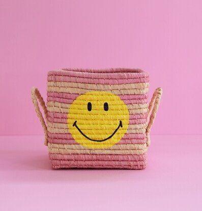 Bild av färgglad förvaringskorg med smileydesign