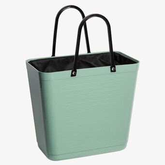 Bild av elegant och funktionell svart innerväska