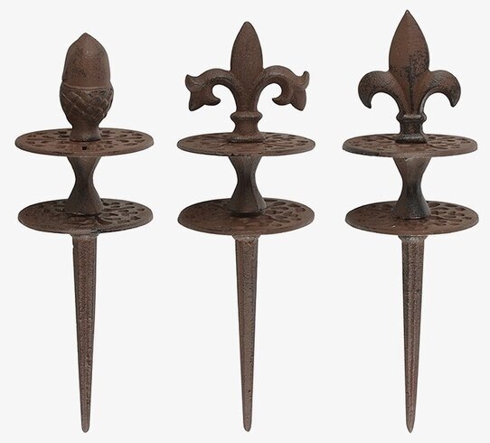 Bild av dekorativa gjutjärnsslangguider för trädgård