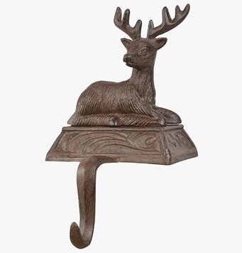 Bild av robust hängare med dekorativ ren i gjutjärn