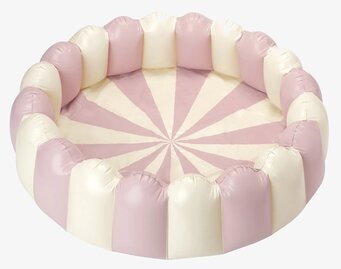 Bild av stor barnpool med mjuka rosa och vita färger