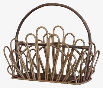 Foto av elegant och funktionell tidningskorg i rotting