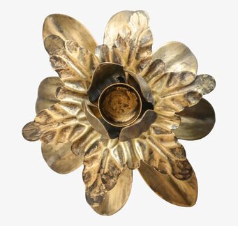 Bild av konstfull ljushållare i antik mässing