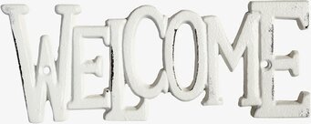 Bild av antik välkomstskylt i krämfärgad metall