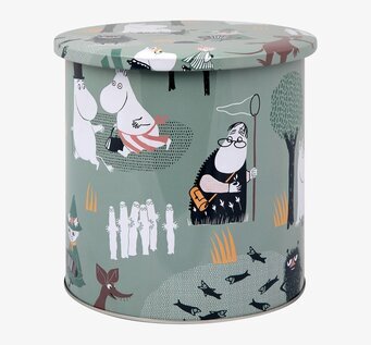 Bild av grön plåtburk med Mumin skogsäventyrstema