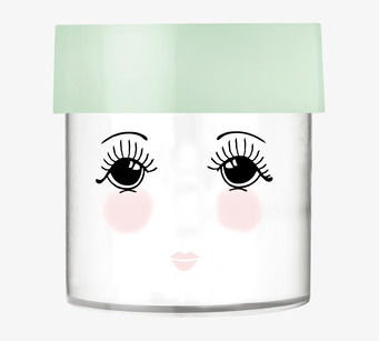 Bild av lekfull förvaringsburk med ansikte och grönt lock