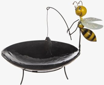Foto av kreativt fågelbad med lekfullt bi-design