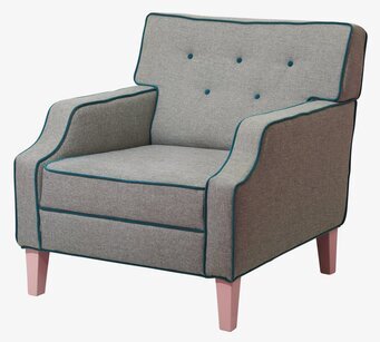 Bild av fåtölj med unik design och eleganta detaljer