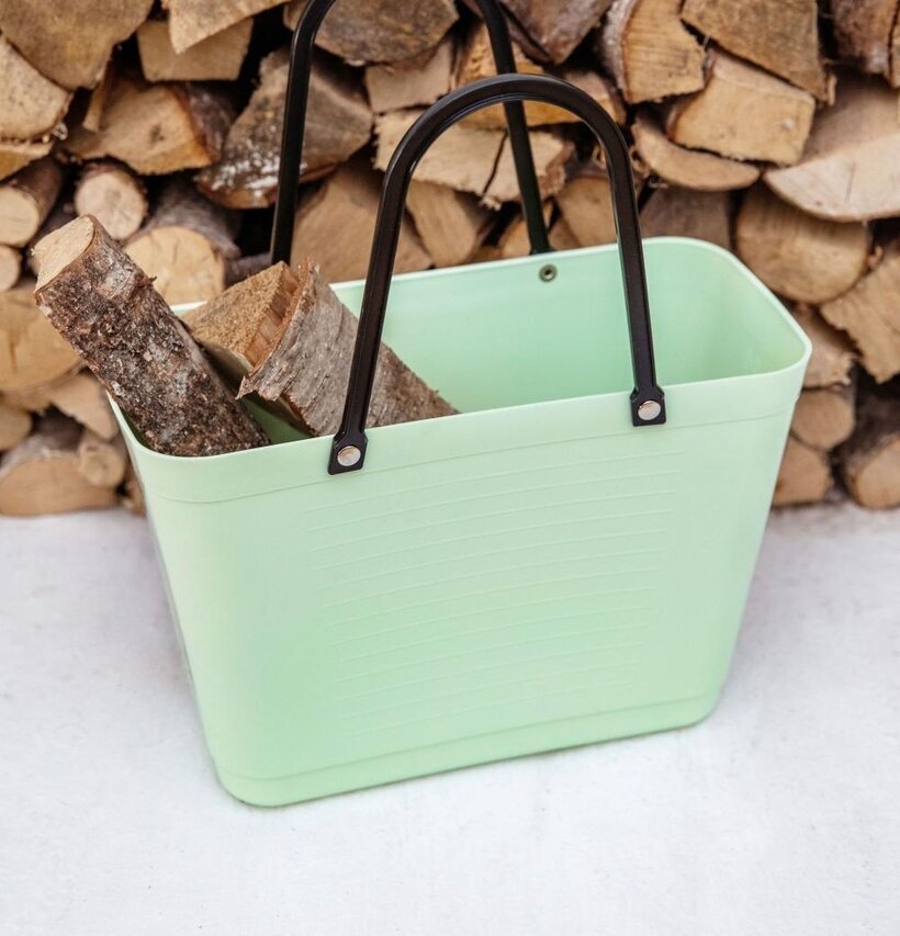 Foto av stilren och funktionell ljusgrön väska